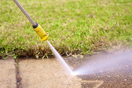 Is Your Driveway Ready for Winter? Why a Fall Pressure Wash Helps Prevent Cracks